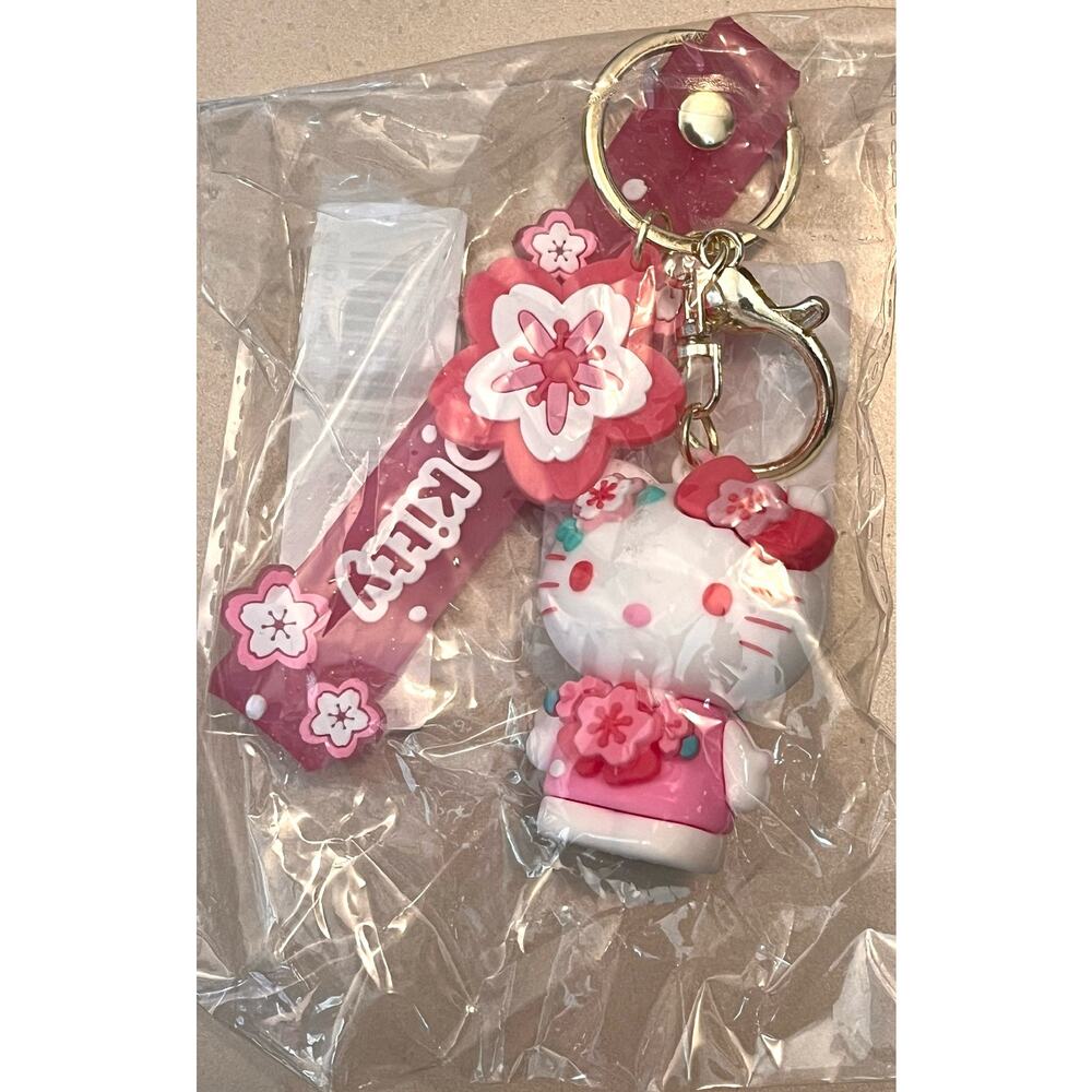 NEW Hello Kitty Figure WRISTBAND KEYCHAIN Key Clip Purse Fob Hawaii Flower Charm - Picture 6 of 12